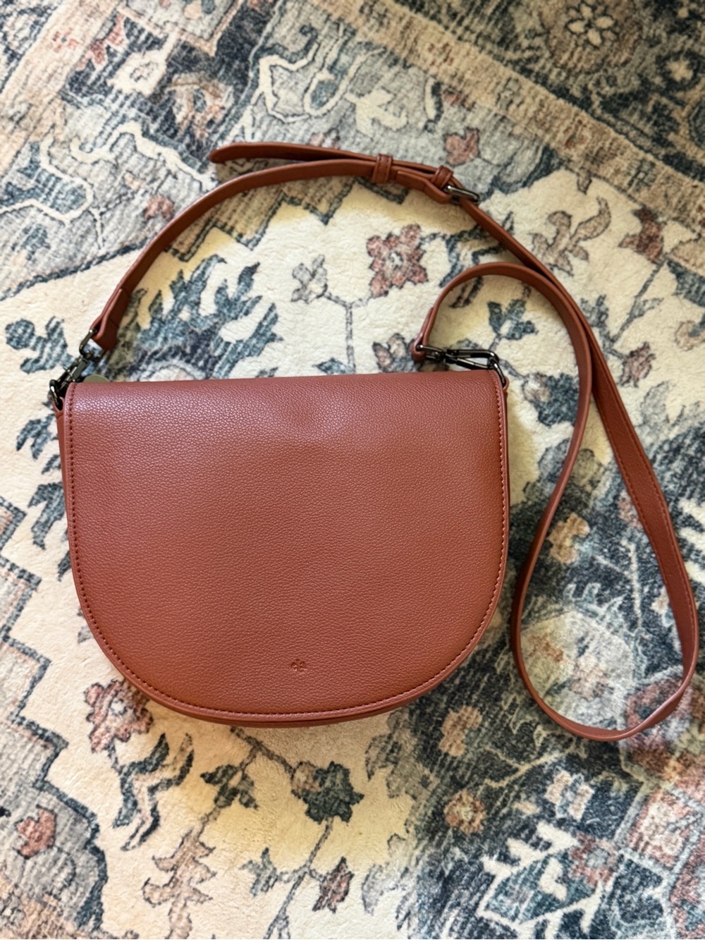 Sleek Pebbled Saddle Satchel in Cognac